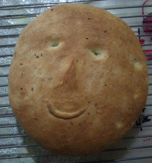 round bread with a peacefull face